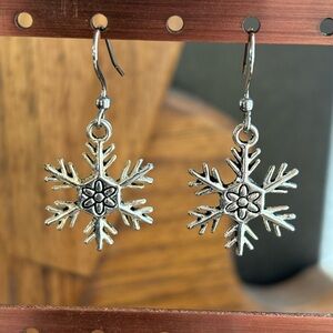 Silver tone snowflake earrings